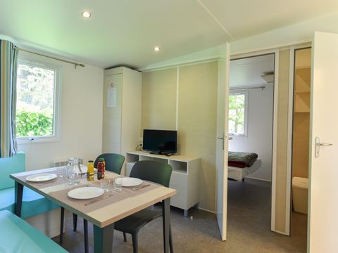 Mobilhome 4 personnes - Caélia Standard 27m² - 2 chambres - Terrasse couverte / Zone piétonne