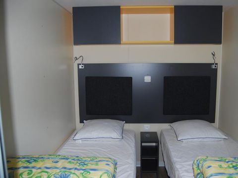 Mobilhome 6 personnes - Mobil-home Standard Relax 33m² - 3 chambres + Terrasse avec parasol - 6 pers
