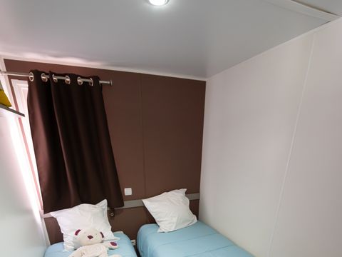 MOBILHOME 4 personnes - Mobil-Home Confort Cocoon Clim 28m² (2ch-4pers) + Terrasse couverte + Clim - Tarif 1 à 4 pers. 4 pers