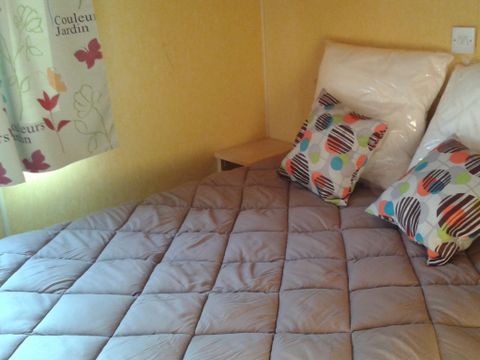 Mobilhome 4 personnes - H5 - 2 chambres - Grande terrasse