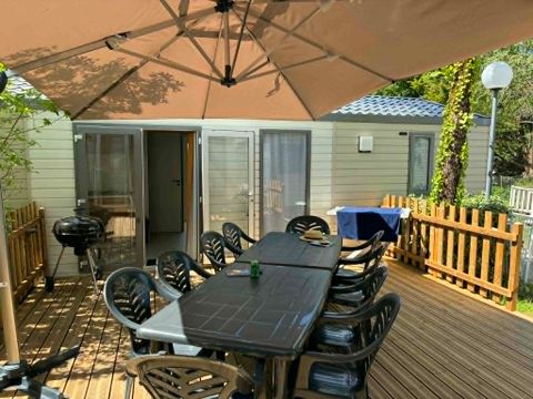 Mobilhome 14 personnes - 5 chambres (+ 1 convertible) - Terrasse couverte
