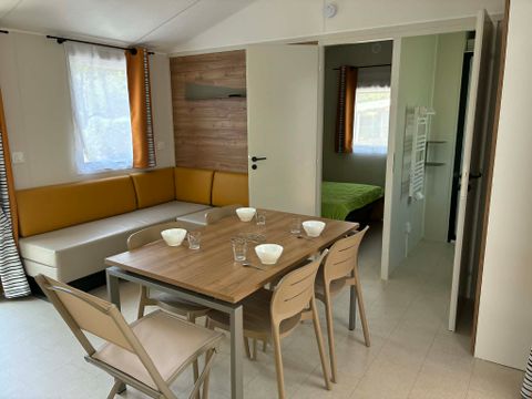 Mobilhome 14 personnes - 5 chambres (+ 1 convertible) - Terrasse couverte