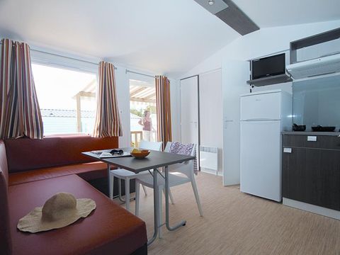 MOBILHOME 4 personnes - 'Evasion Confort Eco' 29m² + 2 chambres + terrasse semi-couverte 13.5m²