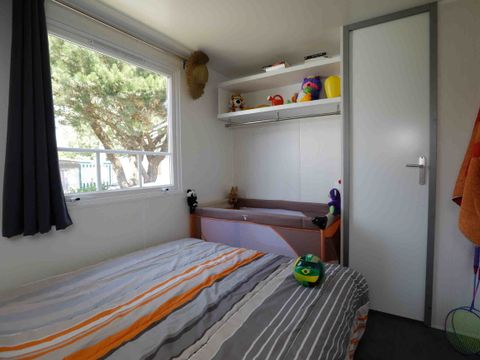 Mobilhome 4/6 personnes - CONFORT - 2 chambres - 28m² terrasse couverte