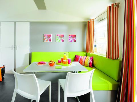 Mobilhome 4 personnes - Confort 26m² - 2 chambres - Terrasse semi couverte - Coté plage