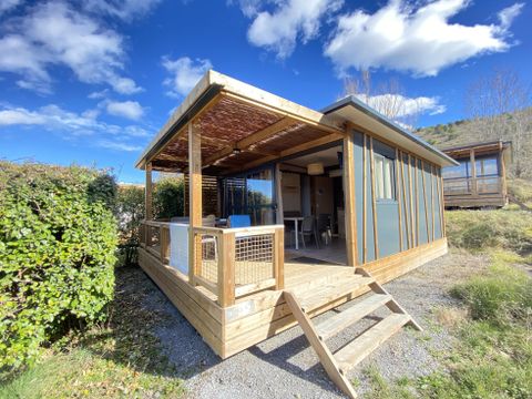 Chalet 5 personnes - NEW Premium 37m² dont 12m² de terrasse couverte - 2 chambres - Clim - Tv - Lave-vaisselle