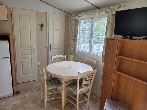MOBILHOME 4 personnes - Confort Supérieur 4p (32m²) avec terrasse couverte, 2 chambres, climatisé