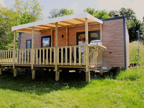 MOBILHOME 4 personnes - Mobil-home PREMIUM 4p (33m²) , 2 chbres, clim, TV, Lave-vaisselle, terrasse, lit Queen Size