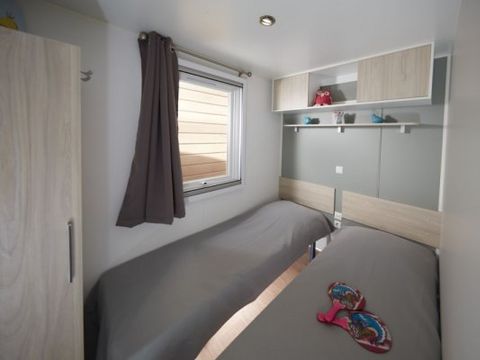Mobilhome 4 personnes - Evolution 45m² - 24m²+21m² de terrasse - 2 chambres