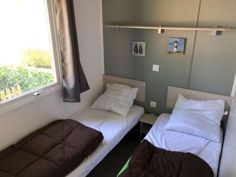 Mobilhome 4 personnes - Evolution 45m² - 24m²+21m² de terrasse - 2 chambres