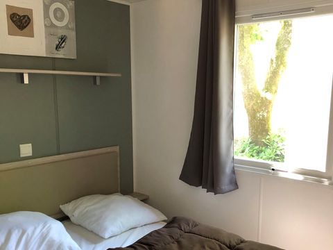 Mobilhome 4 personnes - Evolution 45m² - 24m²+21m² de terrasse - 2 chambres