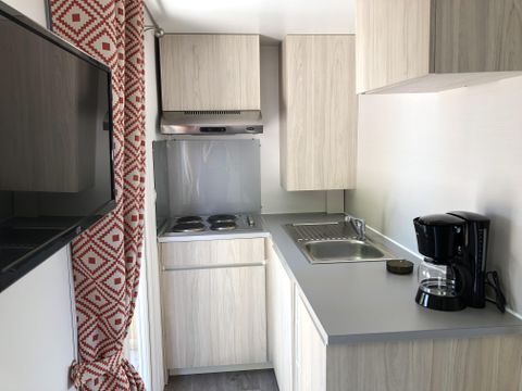 Mobilhome 4 personnes - Evolution 45m² - 24m²+21m² de terrasse - 2 chambres