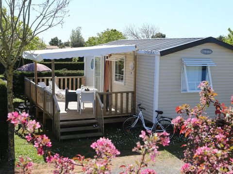 MOBILHOME 4 personnes - Mobil-Home CONFORT 27,5m² (2 chambres) + TV + terrasse semi-couverte | 4 personnes