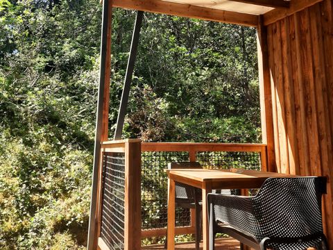 CHALET 2 personnes - Bois Premium 16m² - 1 chambre + terrasse couverte 8m² + TV + CLIM