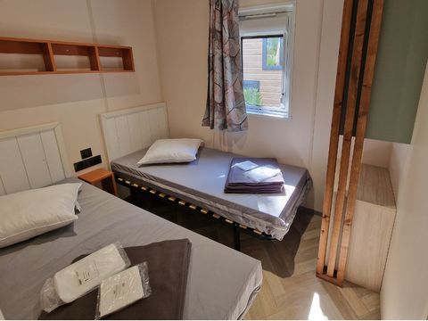 Chalet 4 personnes - Mimosa - 2 chambres avec climatisation