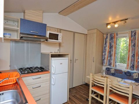 Mobilhome 4 personnes - Classic | 2 Ch. | 4 Pers. | Terrasse surélevée | 1 SDB | Clim