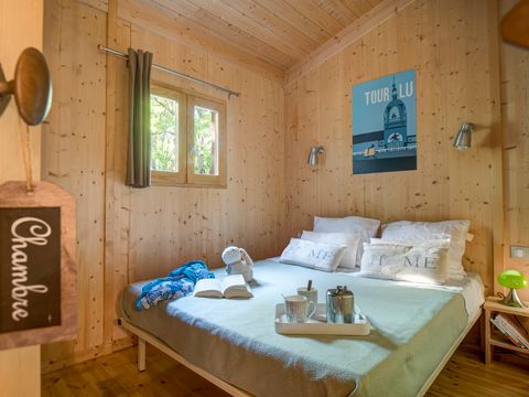 Hébergement 3 personnes - La Cabane du Voyage - Cabane sur pilotis 1 chambre - 24m² + terrasse 16m²