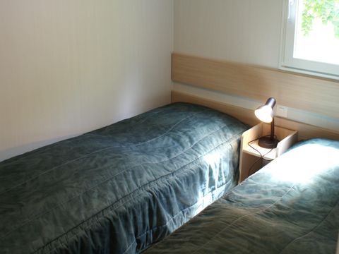 Mobilhome 4 personnes - 'Louisiane' Oakley-Océane-Pacifique (2 chambres) climatisé, TV ,wifi inclus