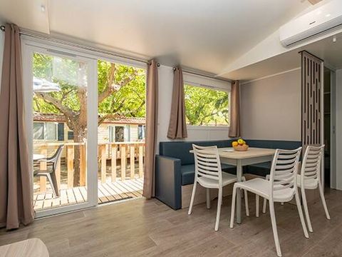 Mobilhome 6 personnes - Premium | 3 Ch. | 6 Pers. | Terrasse surélevée | Clim. | TV