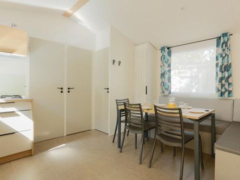 MOBILHOME 5 personnes - Mobil-home Evasion 28.5m² (2 chambres) (- de 8 ans) + TV + Terrasse 4/5 pers