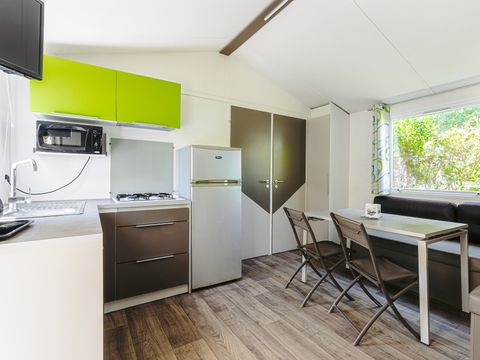 MOBILHOME 5 personnes - Mobil-home Evasion 28.5m² (2 chambres) (- de 8 ans) + TV + Terrasse 4/5 pers