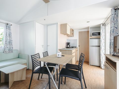 MOBILHOME 5 personnes - Mobil-home Evasion 28.5m² (2 chambres) (- de 9 ans) + TV + Terrasse 4/5 pers