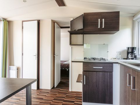 MOBILHOME 2 personnes - Mobil-home Plage 18.6m² (+ de 10 ans) (1 chambre) + Terrasse bois semi-couverte + TV 2 pers