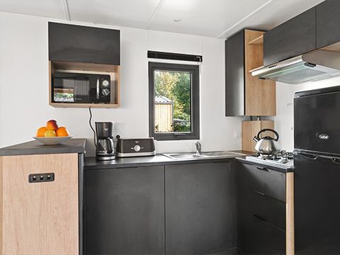 Mobilhome 6 personnes - Ultimate Plus | 3 Ch. | 6 Pers. | Terrasse Couverte | 2 SDB | Clim. | TV