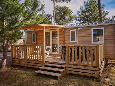 MOBILHOME 6 personnes - Confort | 3 Chambres | Capacité 6 personnes | Terrasse semi couverte | 1 Salle de Bain | Climatisation | Télévision