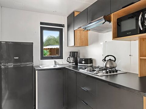 MOBILHOME 4 personnes - 2 Chambres | Capacité 4 personnes | Terrasse semi couverte | 2 Salles de Bain | Climatisation | Télévision