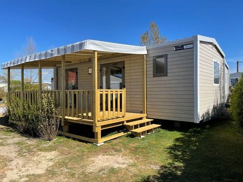 MOBILHOME 5 personnes - remium 30m² (2 chambres) + terrasse couverte 10m² + draps + serviettes + LV + TV 4/5 pers. MOBILHOME 5 personnes - remium 30m² (2 chambres) + terrasse couverte 10m² + draps + serviettes + LV + TV 4/5 pers.