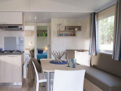 MOBILHOME 4 personnes - Standard 25m² (2 chambres) + terrasse 6m² à 10m² + TV | 4 personnes