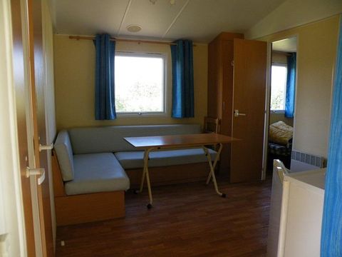 CHALET 4 personnes - Locatif bois avec terrasse couverte - Climatisé