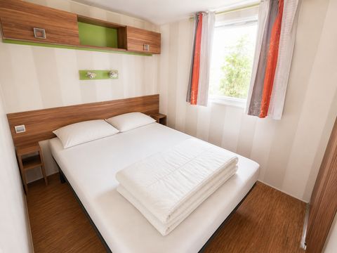 Mobilhome 4 personnes - Confort+ - 2 chambres - Terrasse couverte - 30 m²