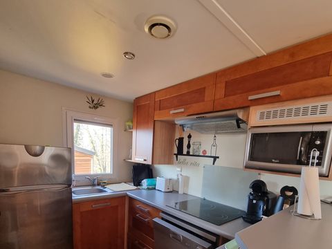 MOBILHOME 4 personnes - 36 Résidence les genêts 32M2, Terrasse Couverte, Télevision + Lave Vaisselle 1/4 pers