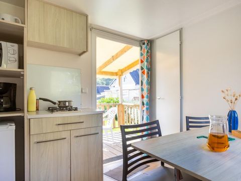 MOBILHOME 4 personnes - 2 chambres (sans sanitaires) 1 couple et 2 enfants de - 40 kgs