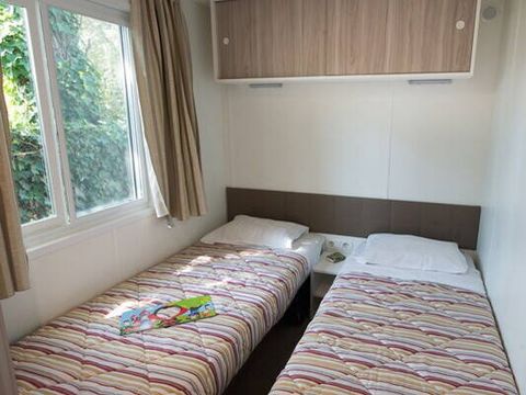 MOBILHOME 4 personnes - Mobil-home | Comfort | 2 Ch. | 4 Pers. | Terrasse surélevée | 2 SDB | Clim.