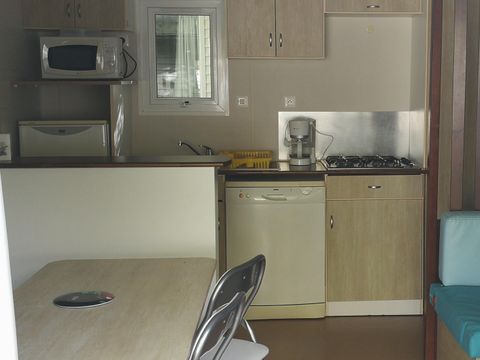 Mobilhome 1/6 personnes - DUO - 2 chambres - 2 salles de bain - 2 WC - 1 canapé-lit - Lave vaisselle - 43,5m² terrasse comprise
