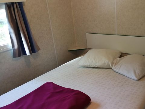 MOBILHOME 4 personnes - Mobil-home ECO - 2 chambres - 34m² terrasse comprise 1/4 pers