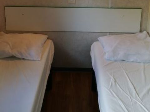 MOBILHOME 4 personnes - Mobil-home ECO - 2 chambres - 34m² terrasse comprise 1/4 pers