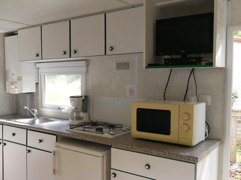 MOBILHOME 4 personnes - Mobil-home ECO - 2 chambres - 34m² terrasse comprise 1/4 pers