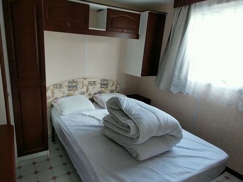MOBILHOME 4 personnes - Nathalie et Didier, sous-location 2 chambres, terrasse couverte + TV