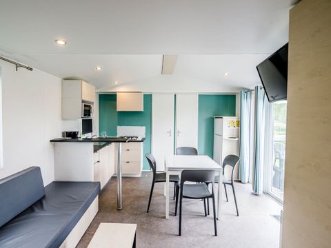 Mobilhome 8 personnes - Familial Confort 40m² Vue Lac - 4 chambres - Terrasse couverte - TV
