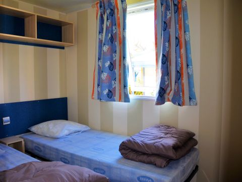 Mobilhome 4 personnes - Confort 29m² - 2 chambres - TV