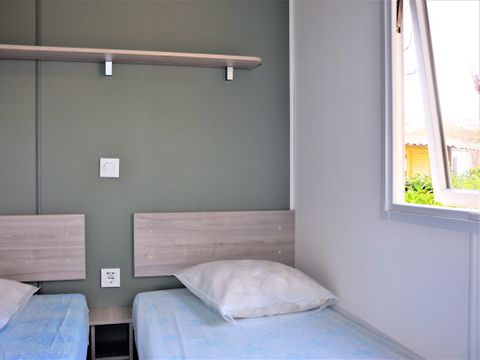 Mobilhome 6 personnes - Premium 32m² - CLIMATISÉ - 3 chambres - TV