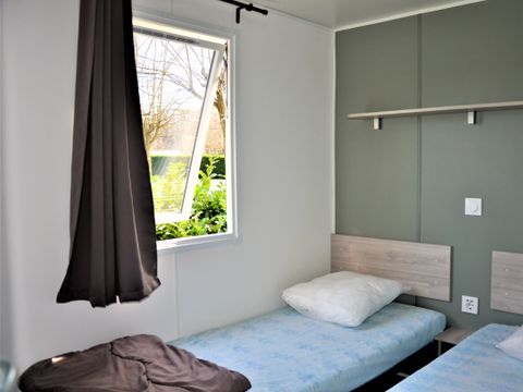 Mobilhome 6 personnes - Premium 32m² - CLIMATISÉ - 3 chambres - TV