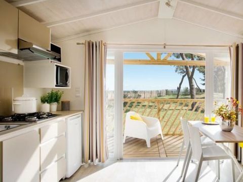 MOBILHOME 4 personnes - Face Confort 25m² (2 chambres) + TV + Terrasse intégrée - Arrivée Dimanche