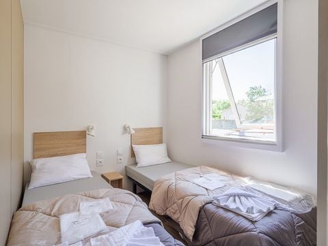 Mobilhome 6 personnes - Premium | 3 Ch. | 6 Pers. | Terrasse surélevée | Clim. | TV