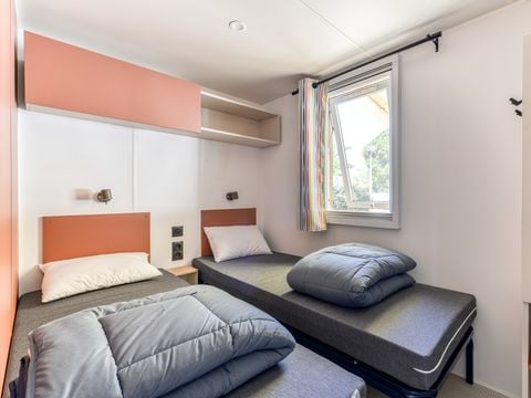 Mobilhome 6 personnes - Premium | 3 Ch. | 6 Pers. | Terrasse surélevée | Clim. | TV