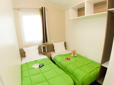 MOBILHOME 4 personnes - ECO Mobil home 2ch. LUDISIA (de + 10 ans) 24 m² + Terrasse semi-couverte 4 pers